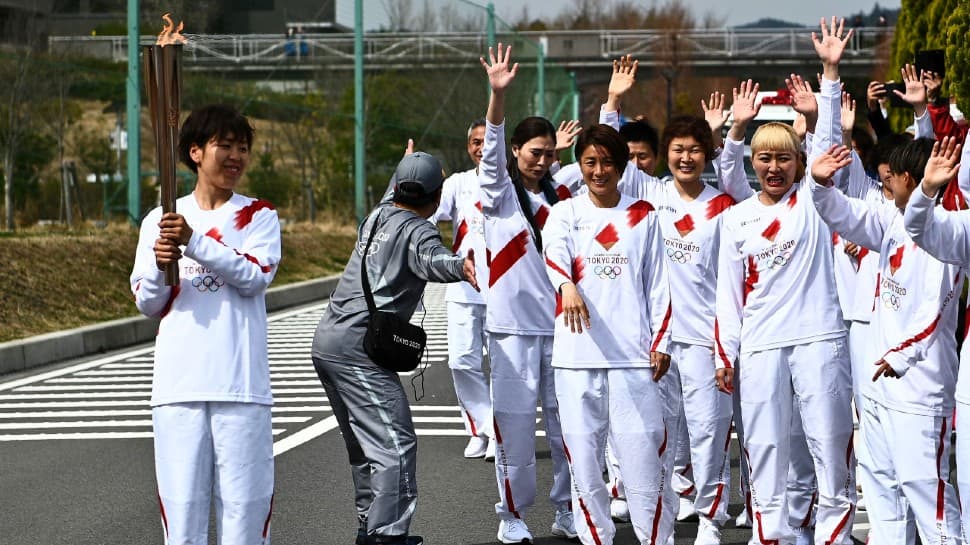 Tokyo Games: Olympics torch relay starts as North Korea launches missiles 