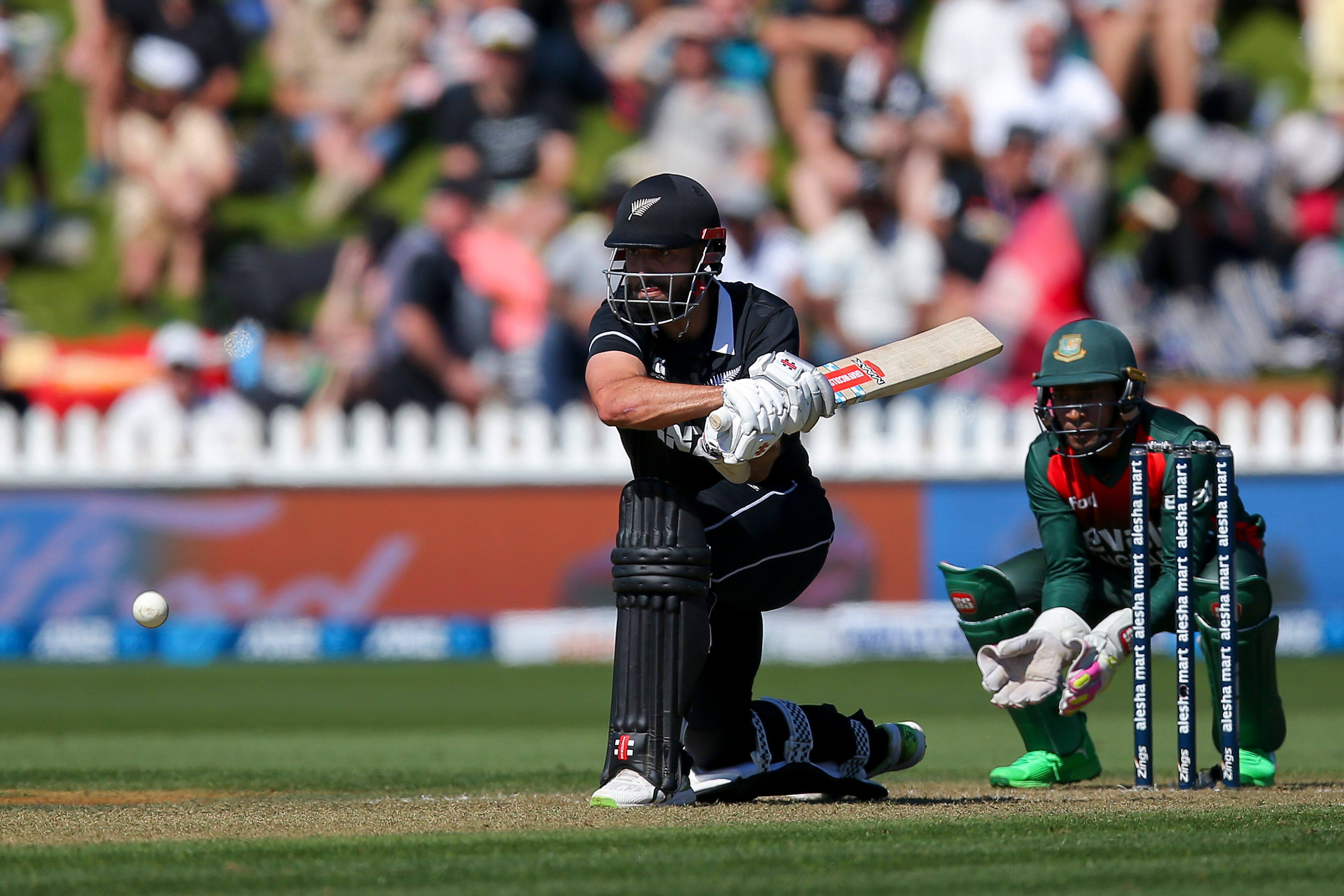 New Zealand all-rounder Daryl Mitchell goes for a reverse sweep on his way to scoring a first hundred in ODIs against Bangladesh in Wellington. (Source: Twitter)