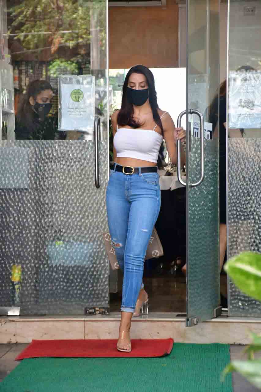 Nora Fatehi steps out in strappy cropped top, ripped jeans after