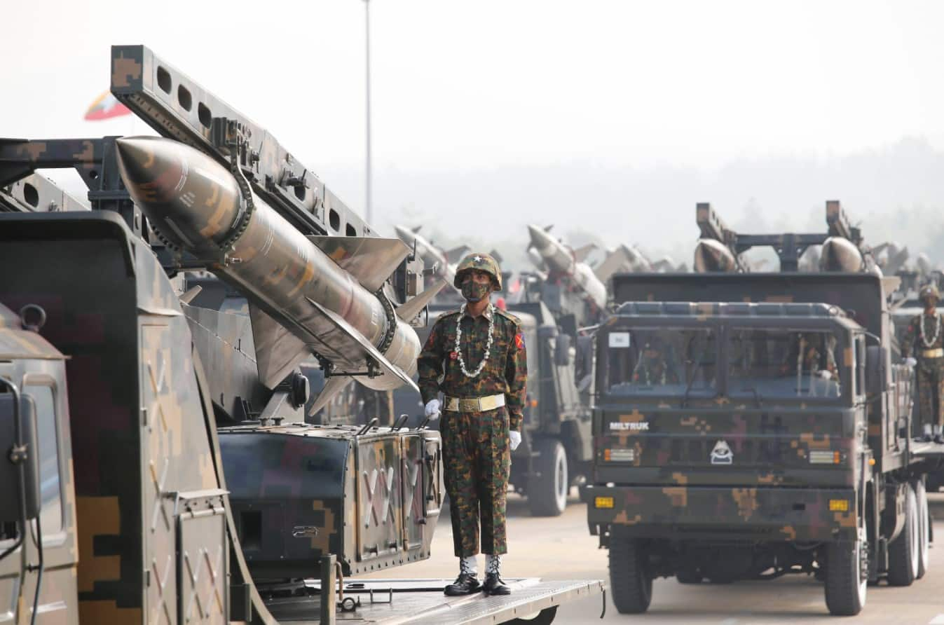 Military personnel participate in a parade on Armed Forces Day 