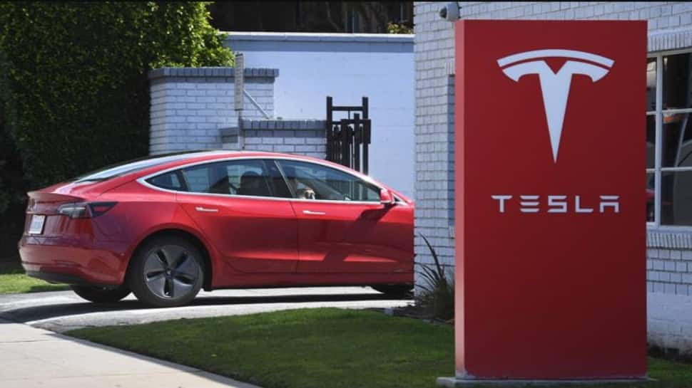 Tesla shares surge after company posts record deliveries