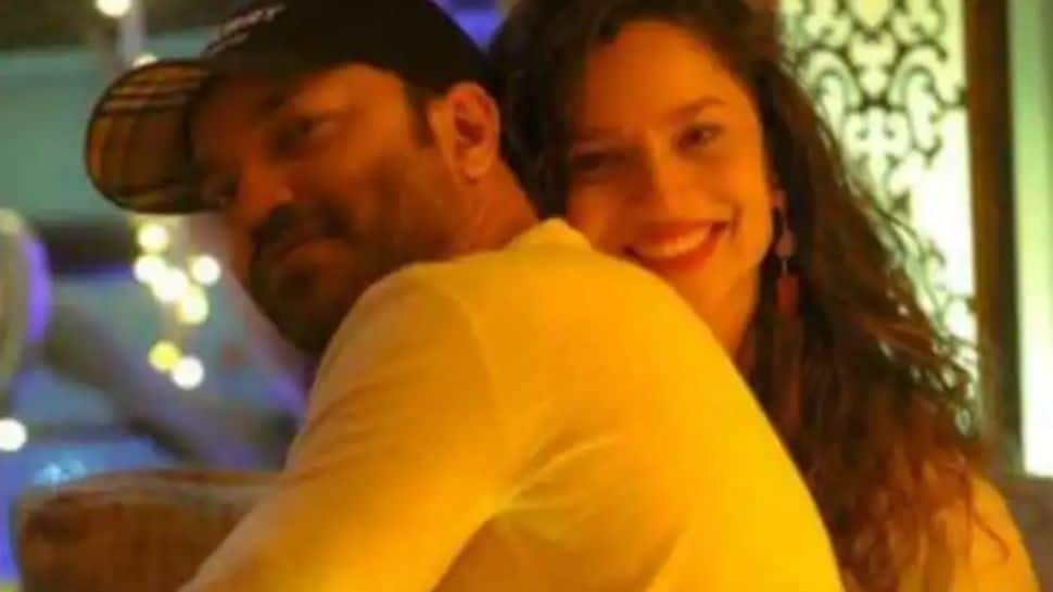 Ankita Lokhande blushes as beau Vicky Jain gives her a quick kiss while dancing - Watch