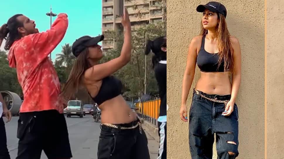 Nia Sharma dons a black sports bra, ripped jeans and dances on Mumbai roads with choreographer - Watch