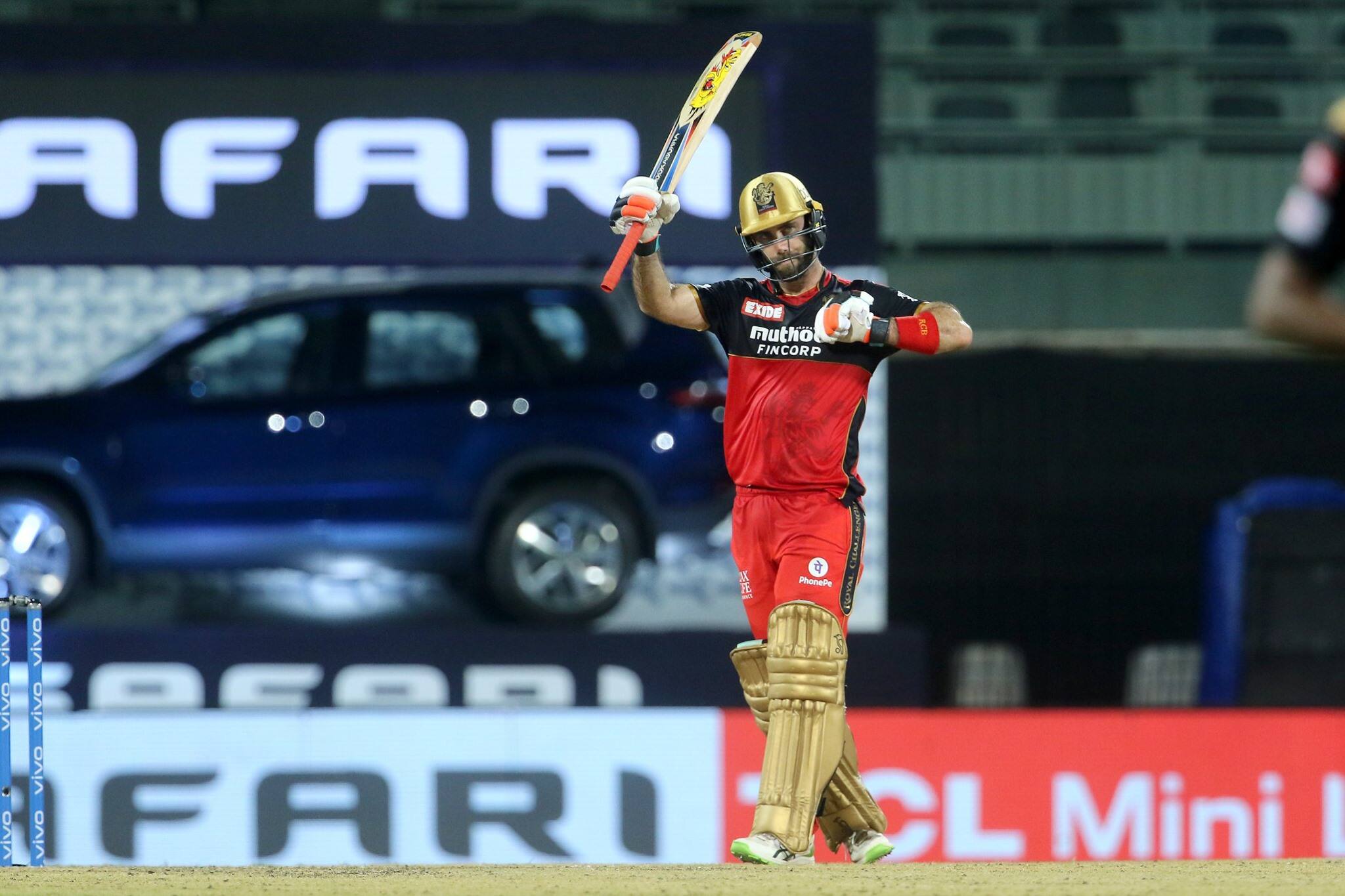 Royal Challengers Bangalore all-rounder Glenn Maxwell acknowledges the cheers after completing a half-century in their IPL 2021 match in Chennai. (Photo: IPL)