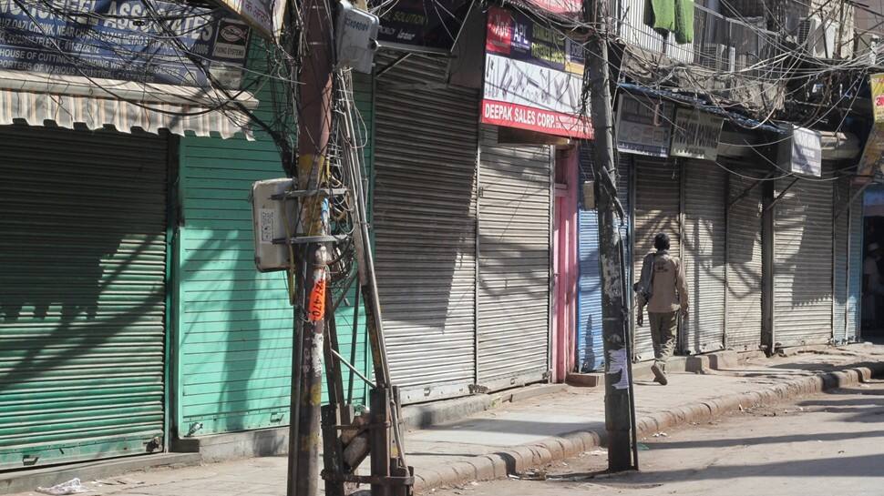 Streets shops remain closed due to weekend curfew imposed in Delhi