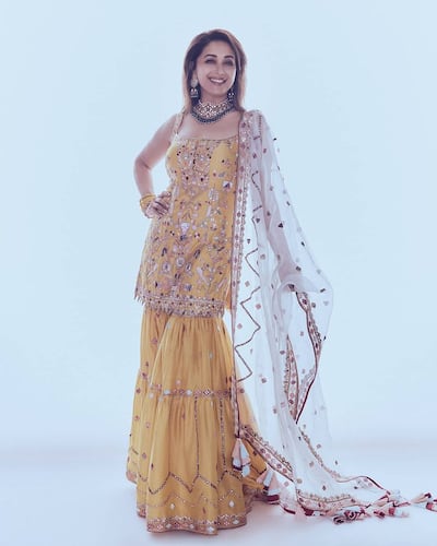 Madhuri Dixit looks fresh as a daisy in a yellow sharara