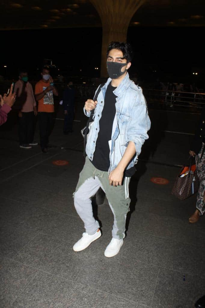 Gauri Khan and Aryan Khan wear matching black masks