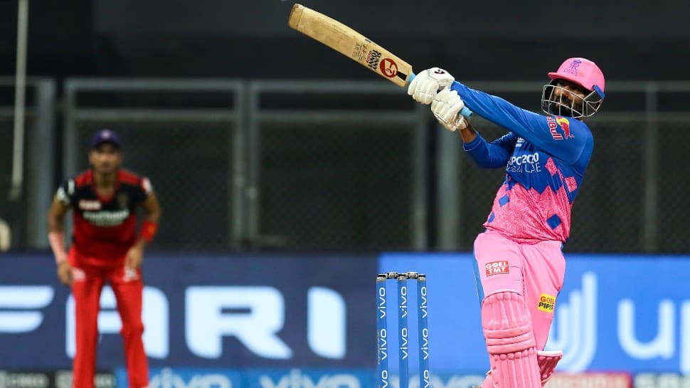 Rajasthan Royals all-rounder Rahul Tewatia hammers a boundary against Royal Challengers Bangalore in their IPL 2021 match in Mumbai. (Photo: PTI)