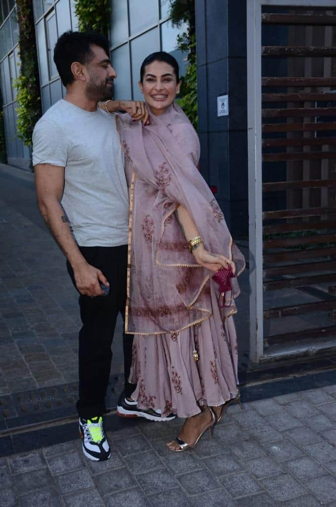 Eijaz and Pavitra smile for the cameras