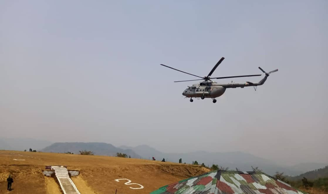 IAF helicopter helping in dousing forest fire