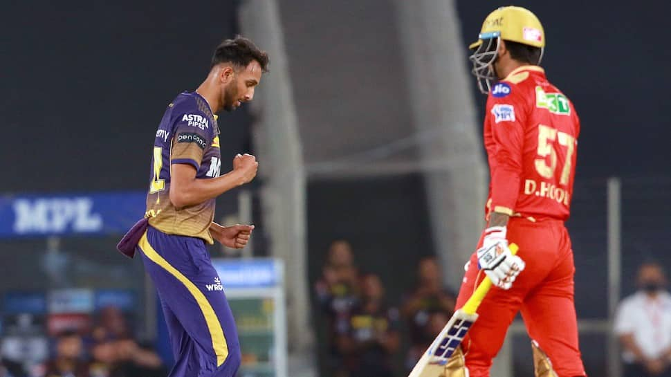 Kolkata Knight Riders paceman Prasidh Krishna (left) celebrates after dismissing Punjab Kings batsman Deepak Hooda at the Narendra Modi Stadium in Ahmedabad. (Photo: ANI)