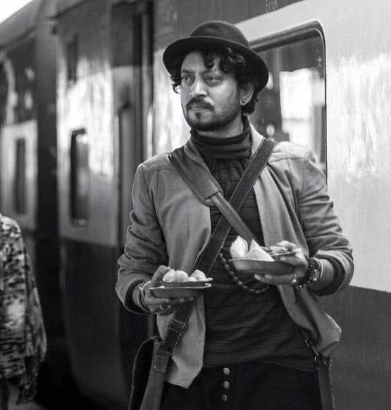 A black and white picture of Irrfan on the sets