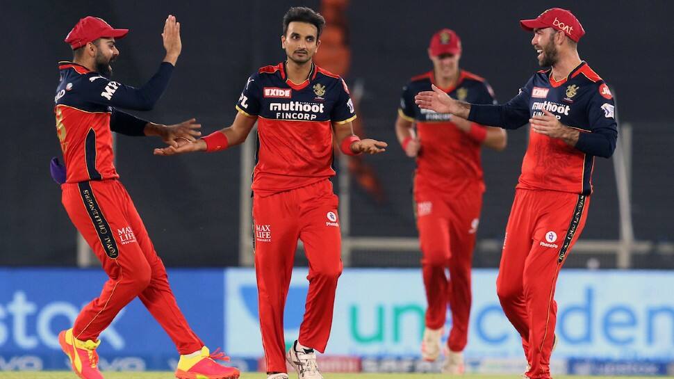 Royal Challengers Bangalore paceman Harshal Patel celebrates after picking up a wicket against Delhi Capitals in their IPL 2021 match in Ahmedabad. (Photo: ANI)