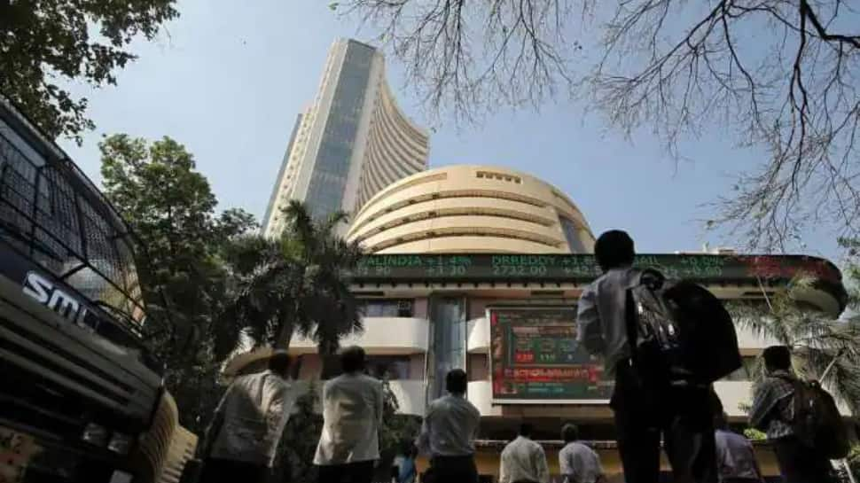 Market update: Sensex, Nifty shed day’s gain to end flat 