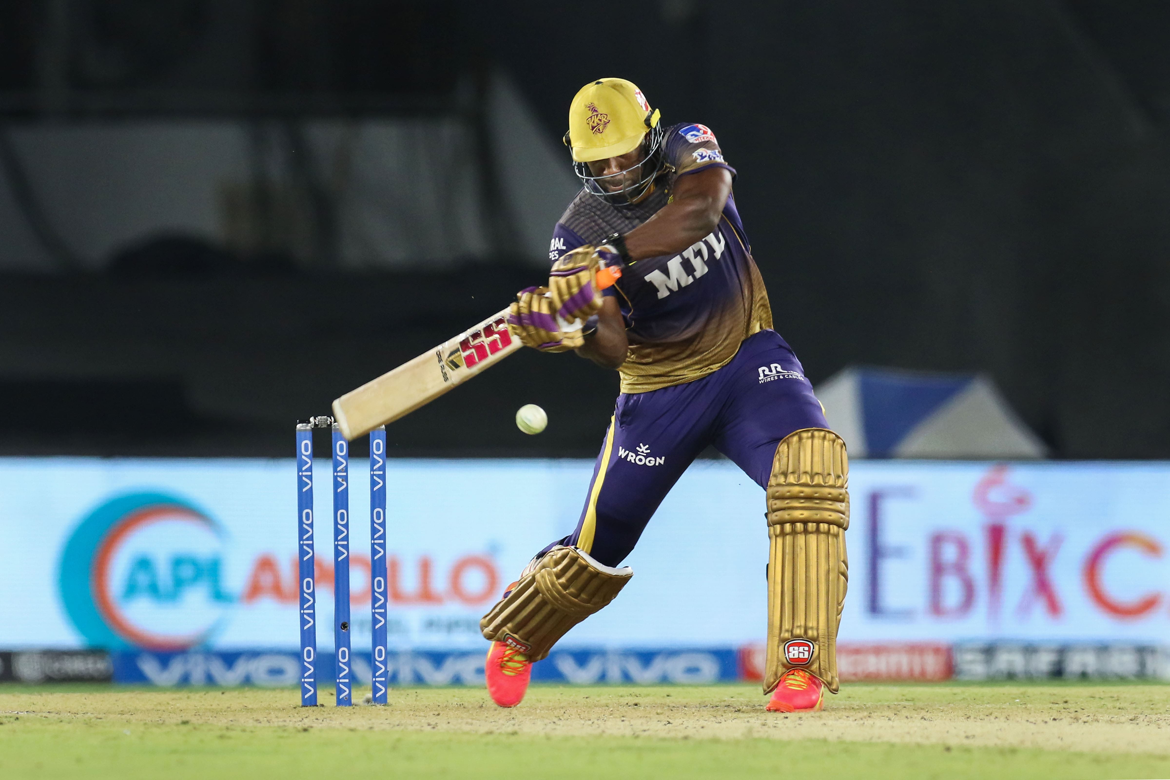 Kolkata Knight Riders all-rounder Andre Russell smashes a four against Delhi Capitals at the Narendra Modi Stadium in Ahmedabad. (Photo: PTI)