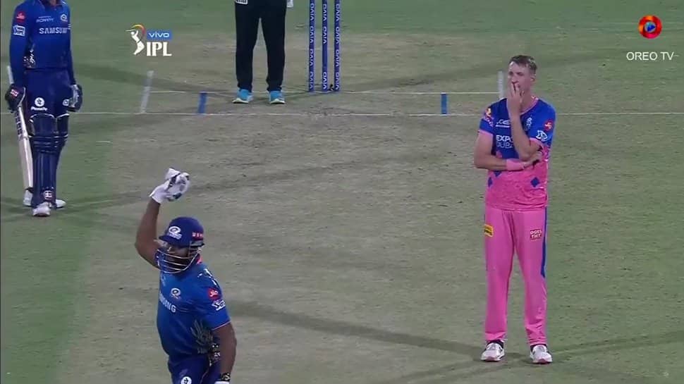 IPL 2021: Kieron Pollard cheers for ball to reach boundary after being hit by Chris Morris bouncer on head - WATCH