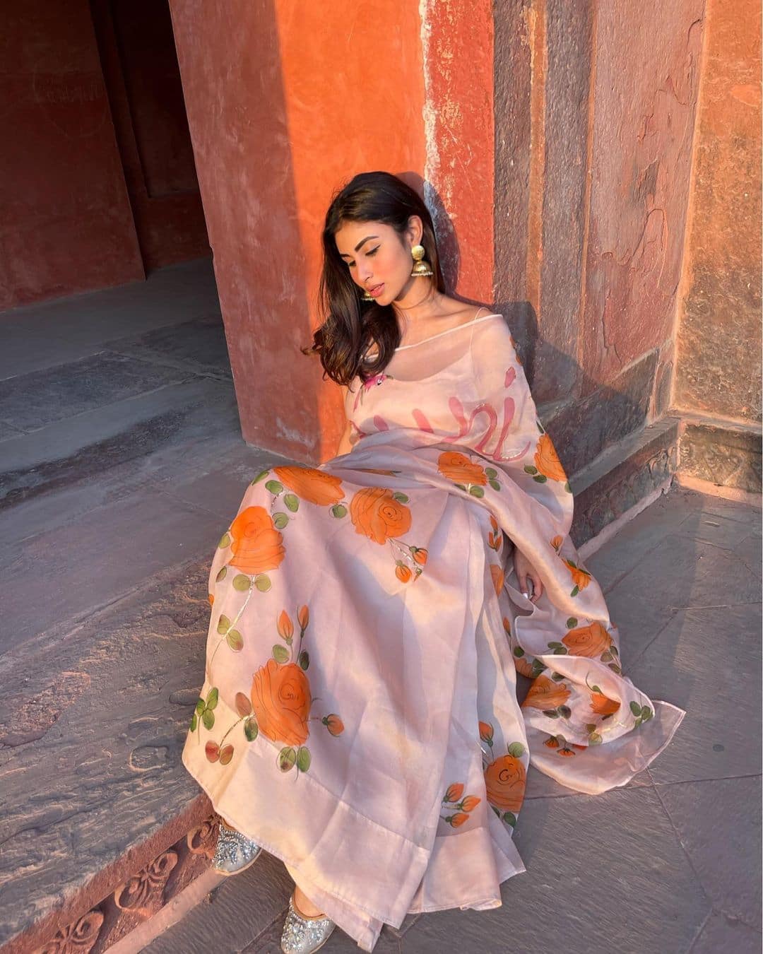 Mouni looks fresh as a daisy in pink saree