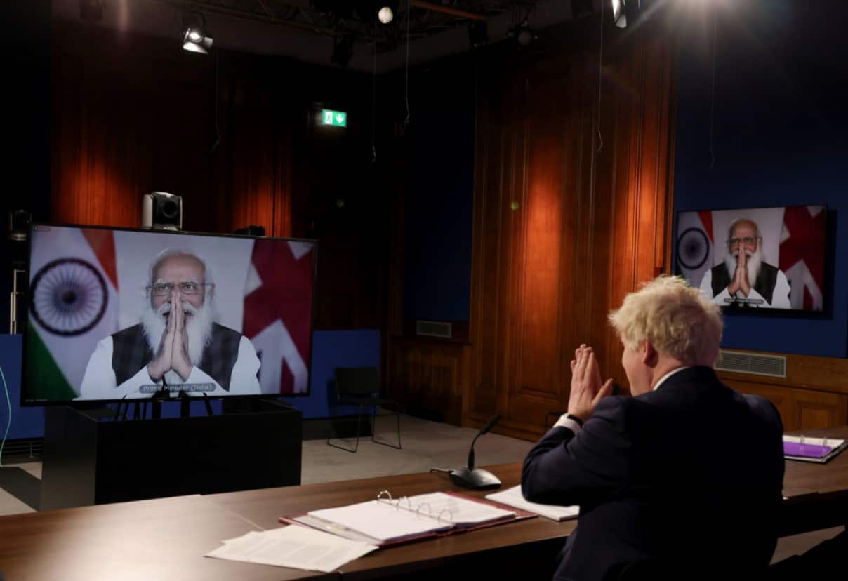 Indian PM Narendra Modi and United Kingdom PM Boris Johnson during virtual summit Indian PM Narendra Modi and United Kingdom PM Boris Johnson during virtual summit