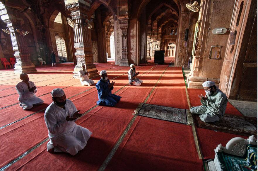 Muslim devotees offering Eid prayers