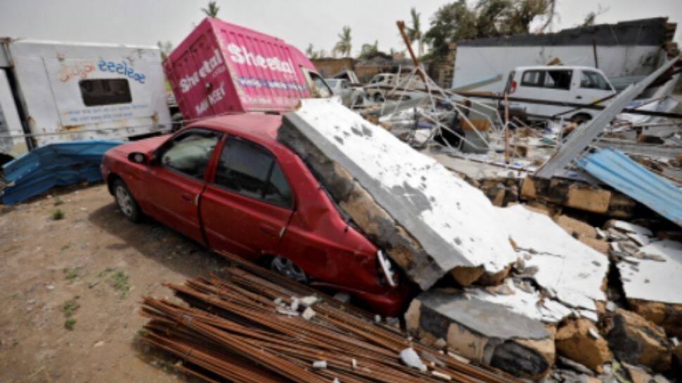 Car damaged by cyclonic storm in Una