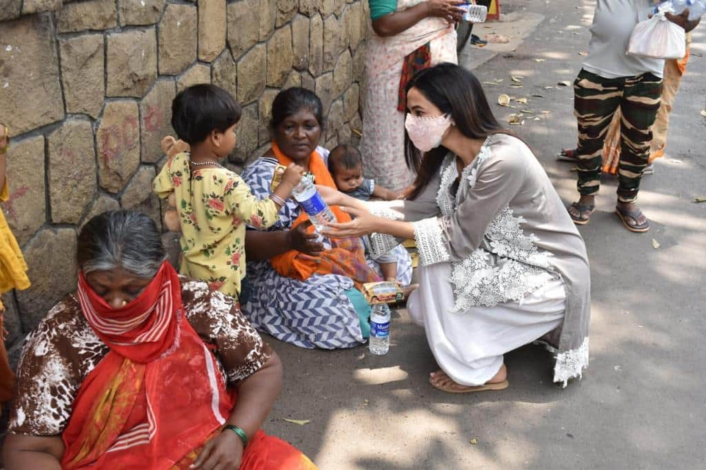 She distributes food to the needy