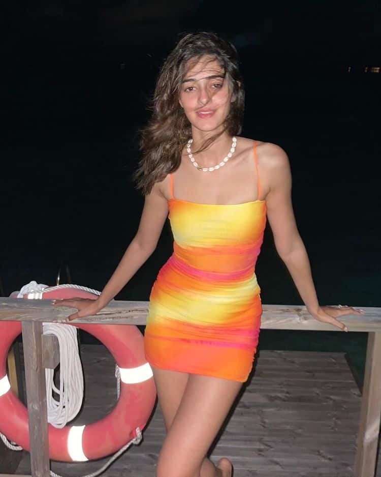 Ananya sizzles in an orange and yellow short bodycon dress