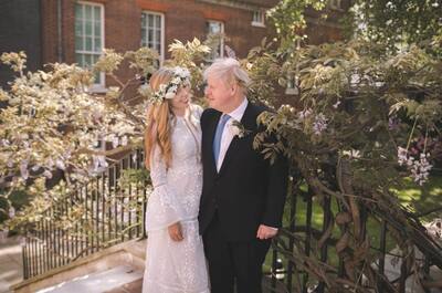 Boris Johnson and Carrie Symonds are seen in the garden of 10 Downing Street after their wedding in London