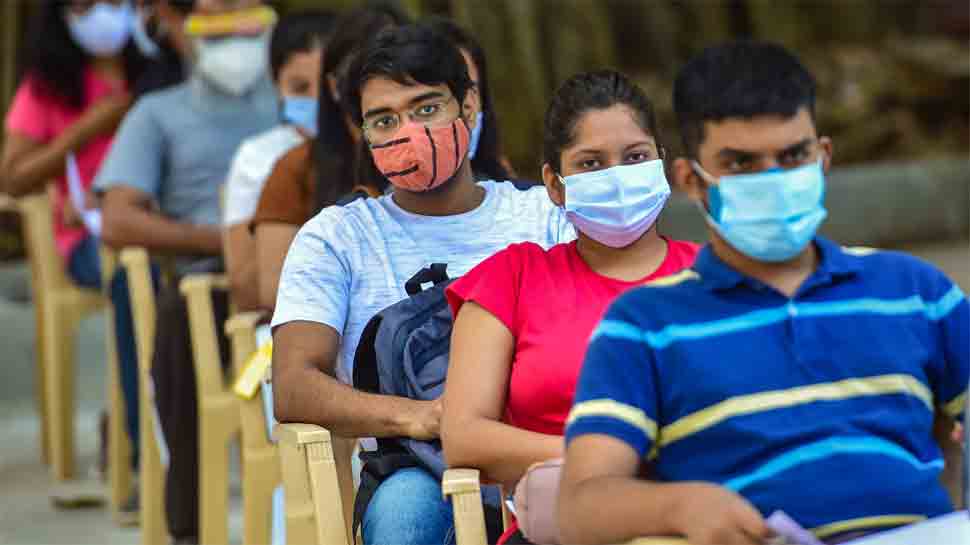 Citizens wait in a long queue to get COVID shot 