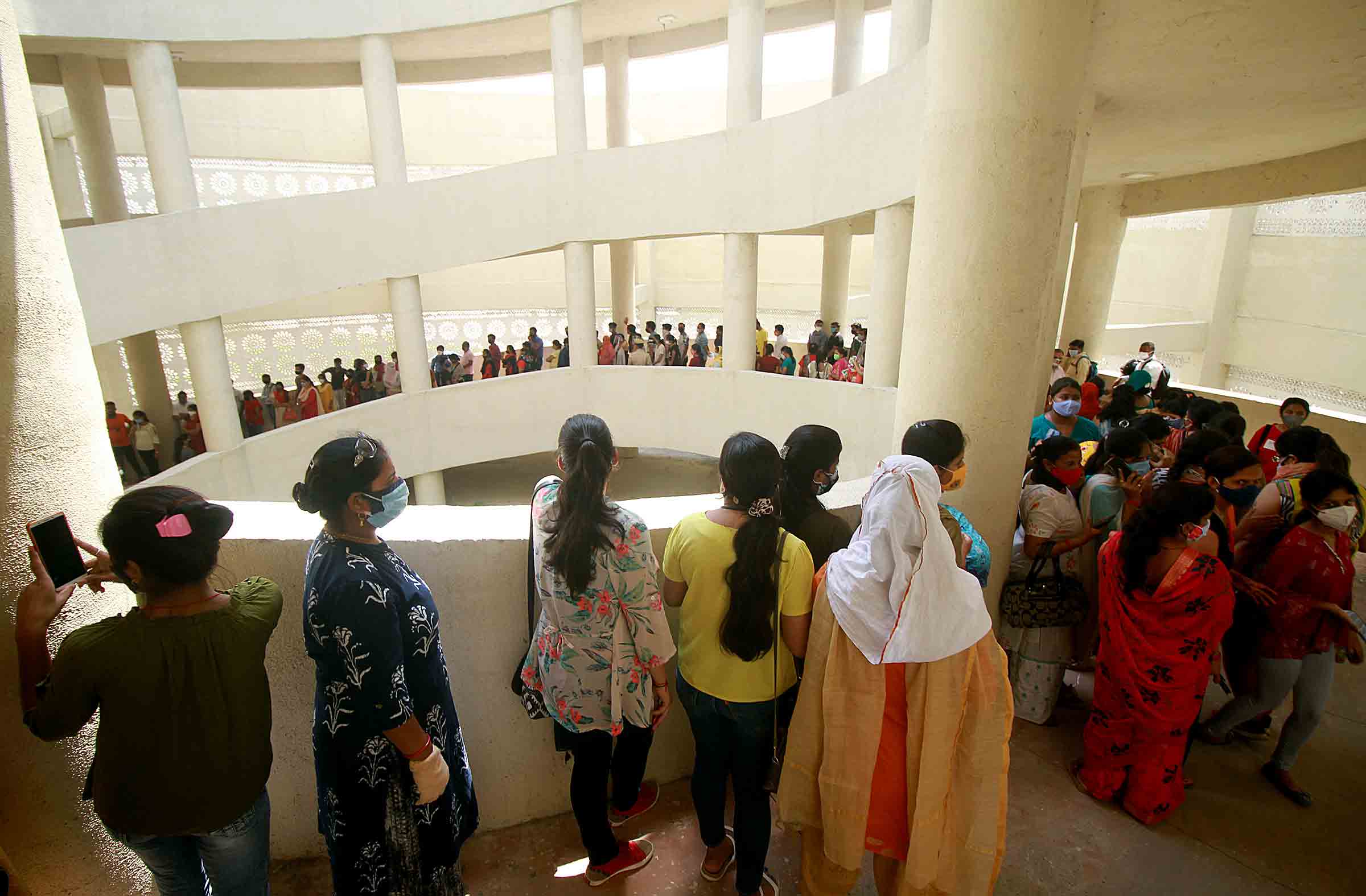 Long queues seen outside COVID vaccination centres