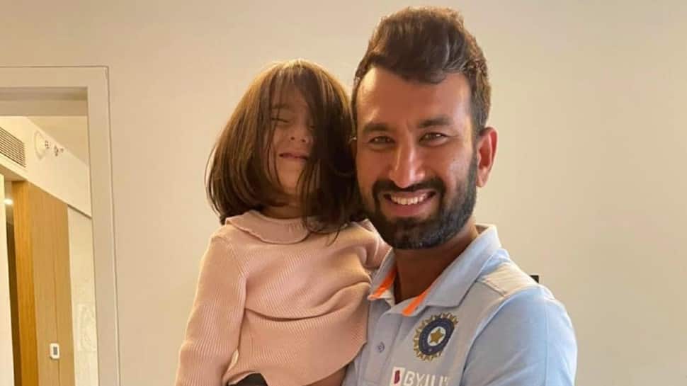 Cheteshwar Pujara seen with his two-year-old daughter Aditi. (Source: Twitter)