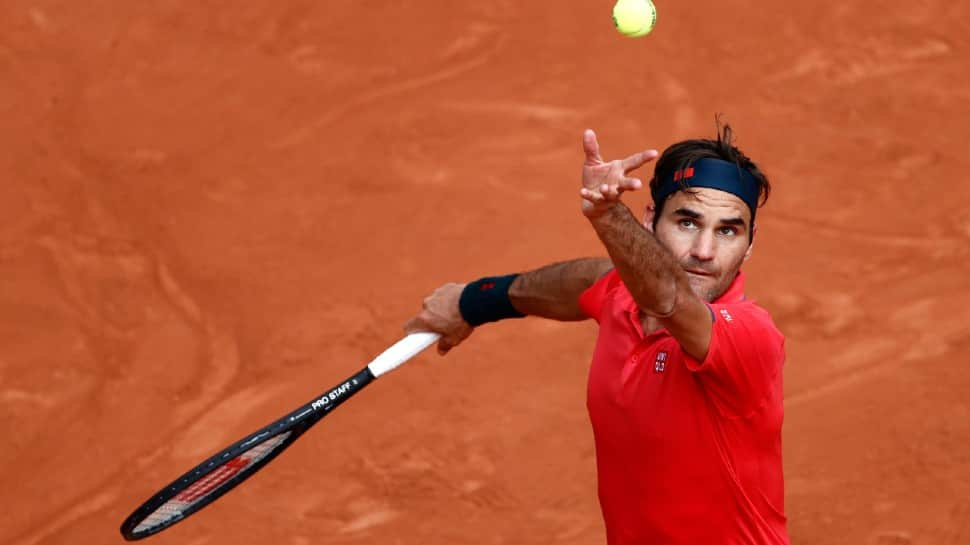 French Open: Roger Federer happy to find higher gear against Marin Cilic