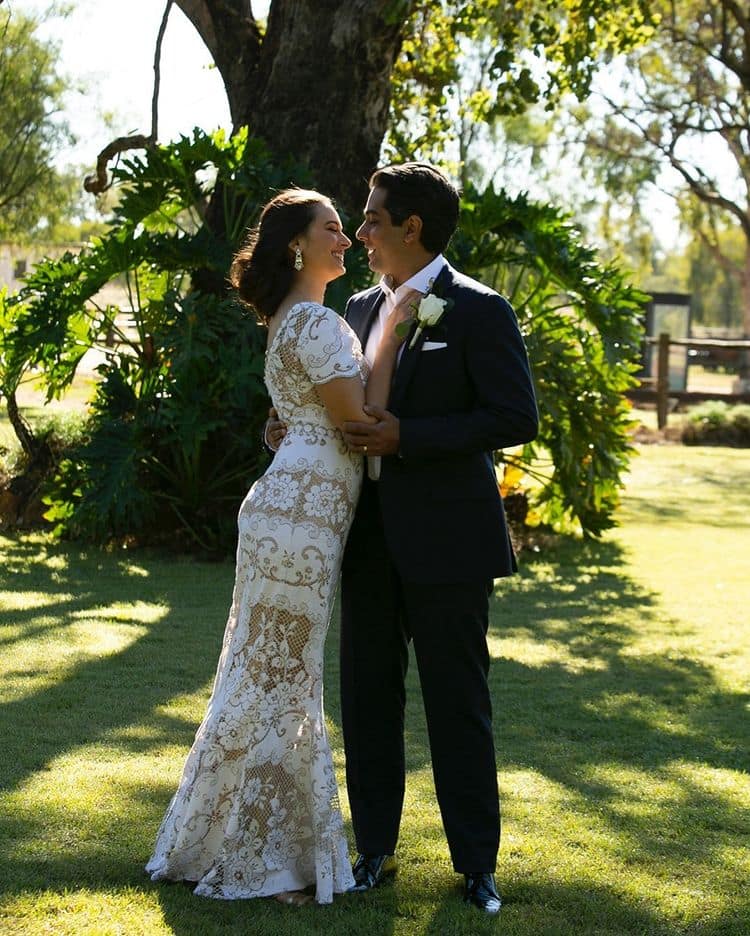 Evelyn is a vision to behold in a white dress