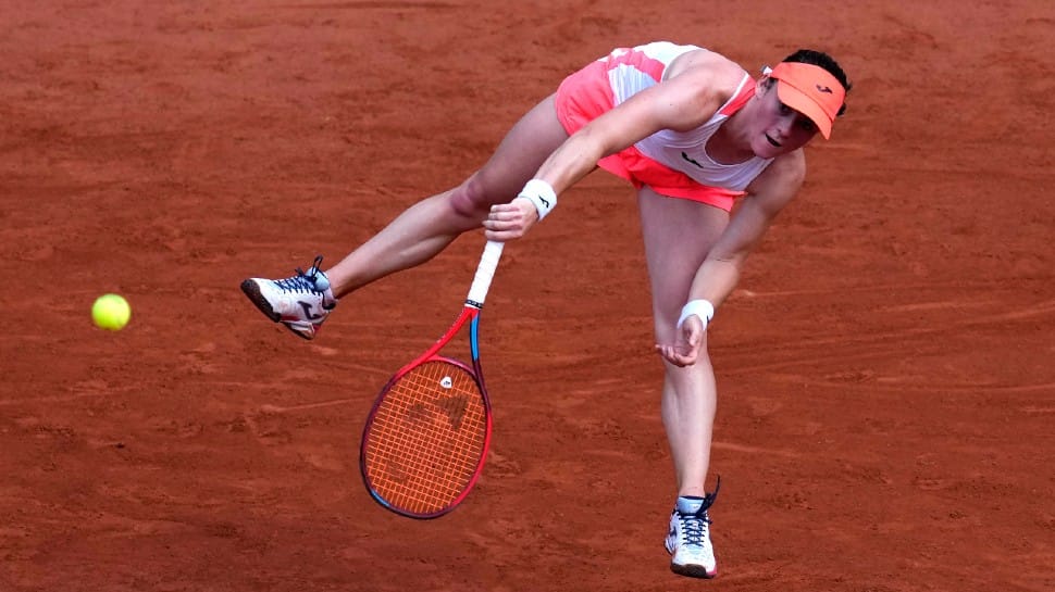 Tamara Zidansek serves to Paula Badosa in their French Open 2021 quarterfinal match at Roland Garros in Paris. (Photo: PTI)