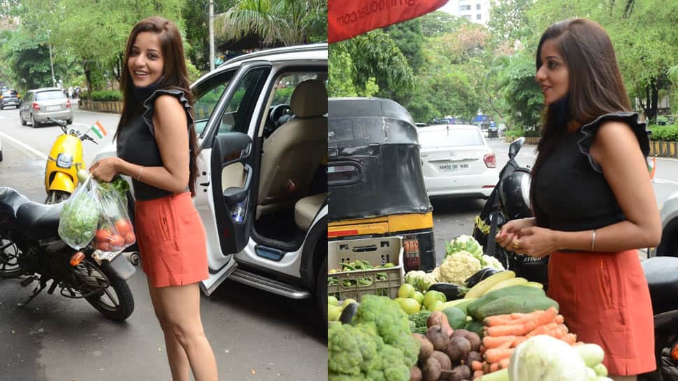 Bhojpuri sensation Monalisa spotted buying veggies in orange shorts and black top, smiles at paps - In Pics
