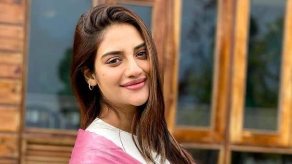 Nusrat Jahan cradles her baby bump, exudes pregnancy glow - See pics!