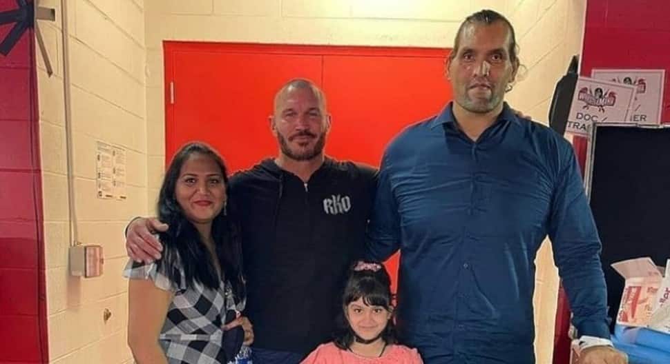 The Great Khali with wife Harpinder and daughter Avlani seen with WWE star Randy Orton. (Source: Twitter)
