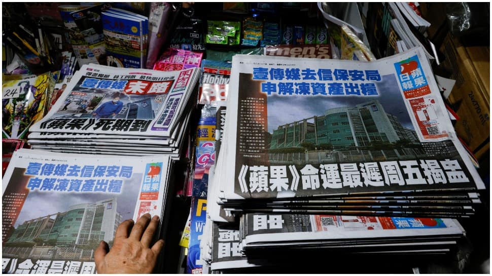 Hong Kong police arrest Apple Daily lead writer and reporter under national security law