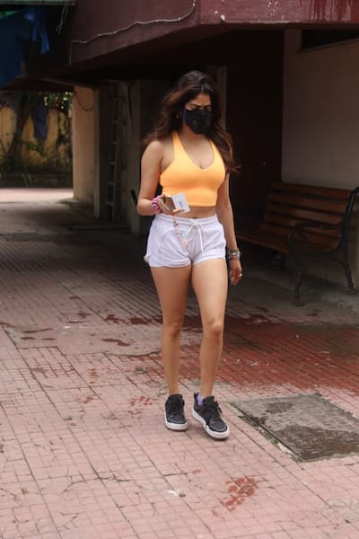 Janhvi spotted in tangerine sports bra and white shorts