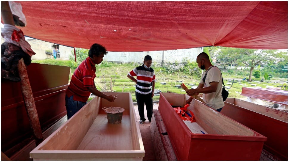 COVID-19 scare: Overwhelmed Indonesian coffin maker warns of increasing cases