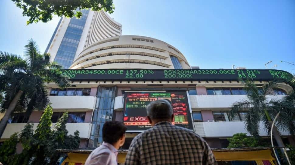 Sensex, Nifty end flat in highly volatile trade; realty stocks rally