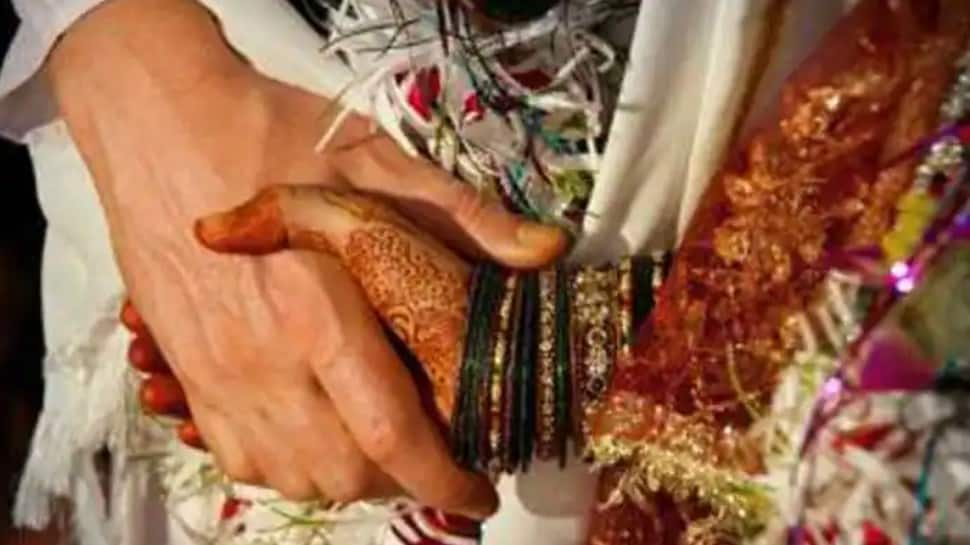 Leaked interfaith wedding card leads to &#039;love jihad&#039; protests, family forced to cancel ceremony