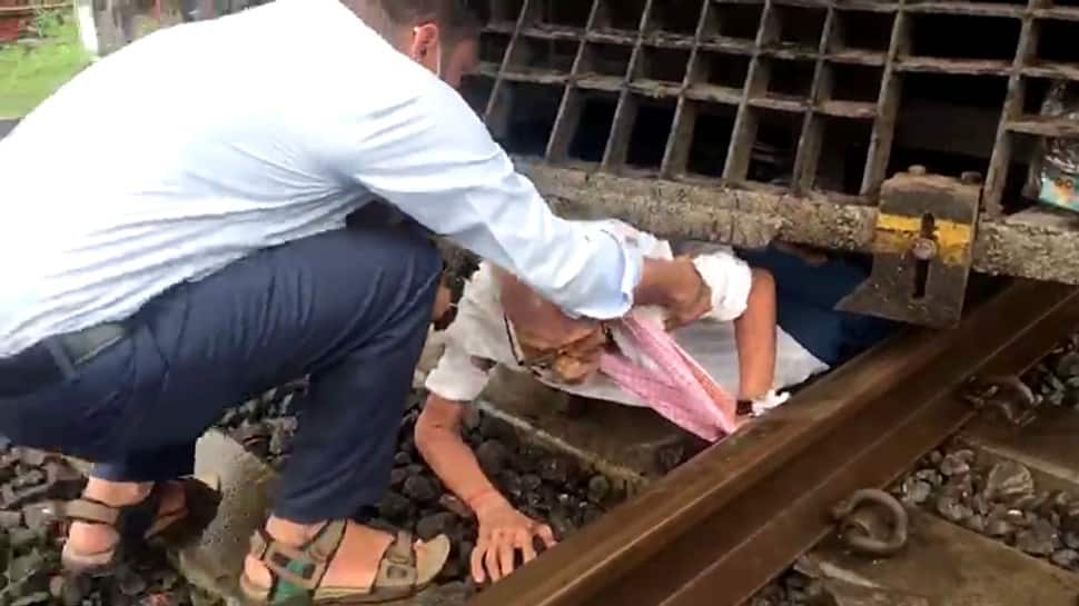Elderly man narrowly escapes death as train drivers apply emergency brakes – Watch