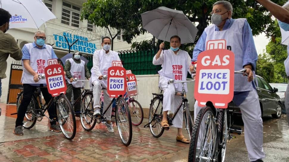 In unique protest against petrol, diesel, LPG price hike, Trinamool Congress MPs cycle to Parliament