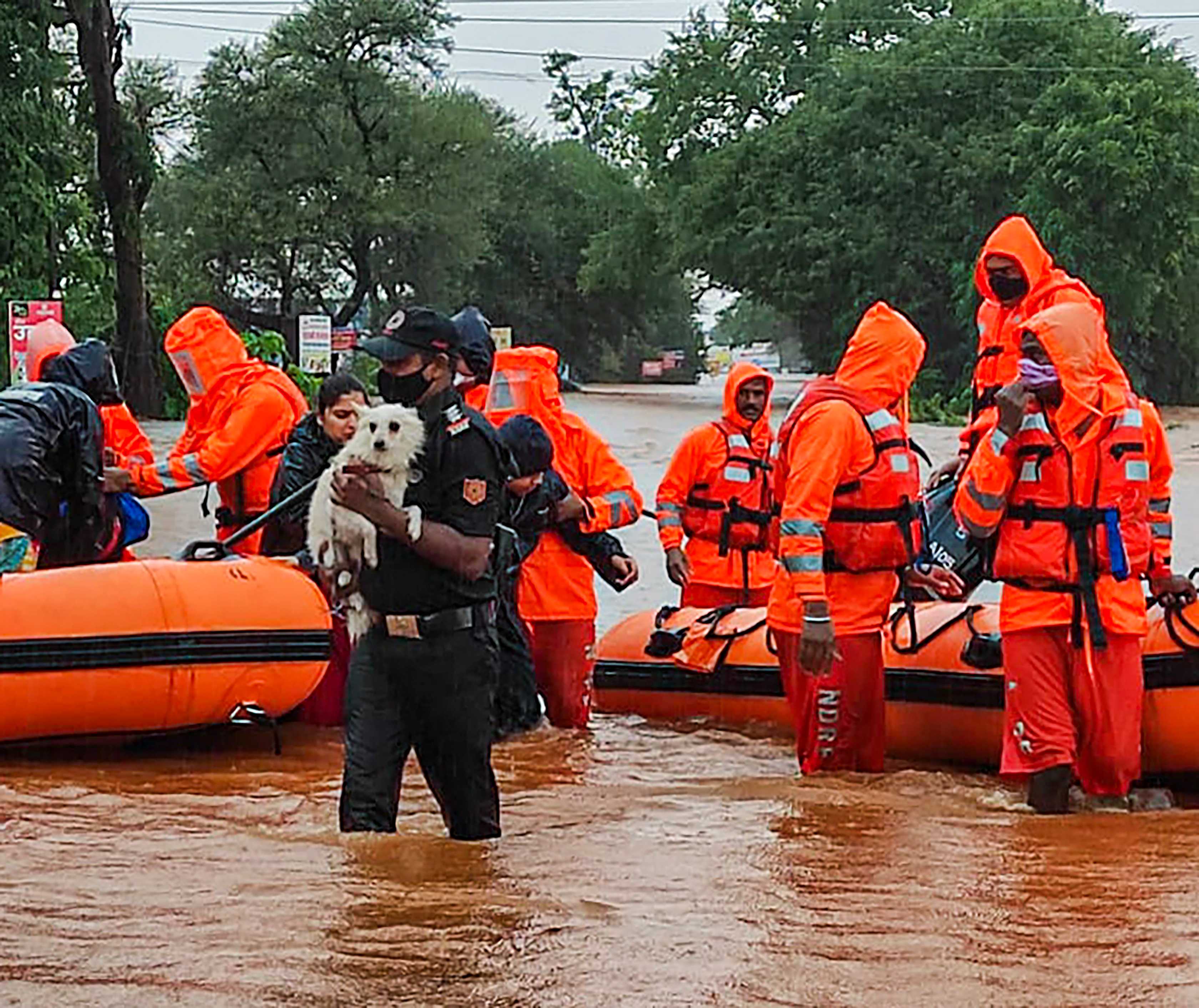 NDRF team during a rescue operation after heavy rain at Chikhali village in Kolhapur. 