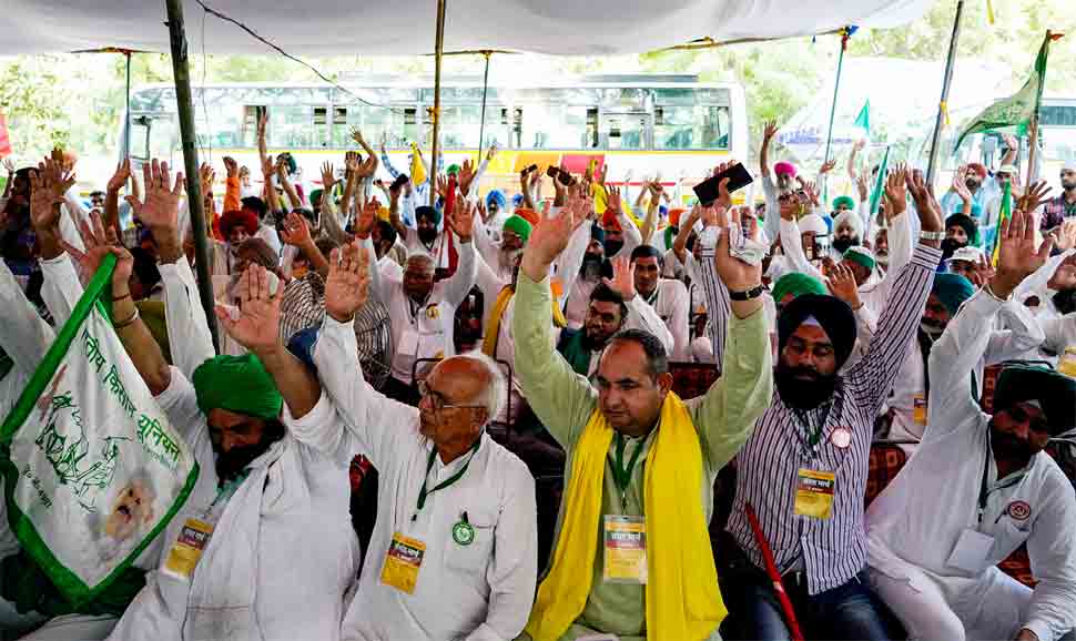 Farmers hold protest in Haryana's Rohtak, push barricades with tractors