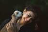 Jacqueline Fernandez holds a baby goat