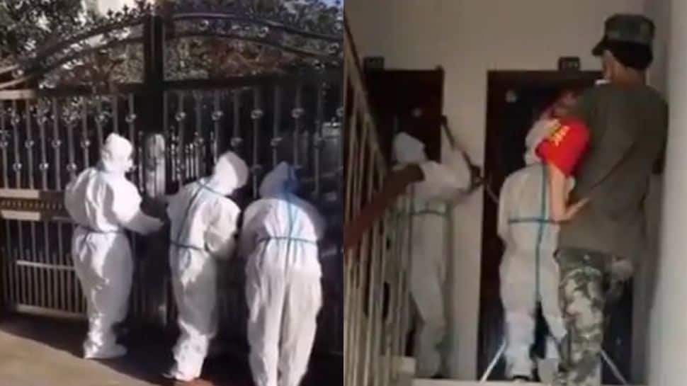 Videos show Chinese officials locking people inside their houses as Delta variant cases surge- Watch