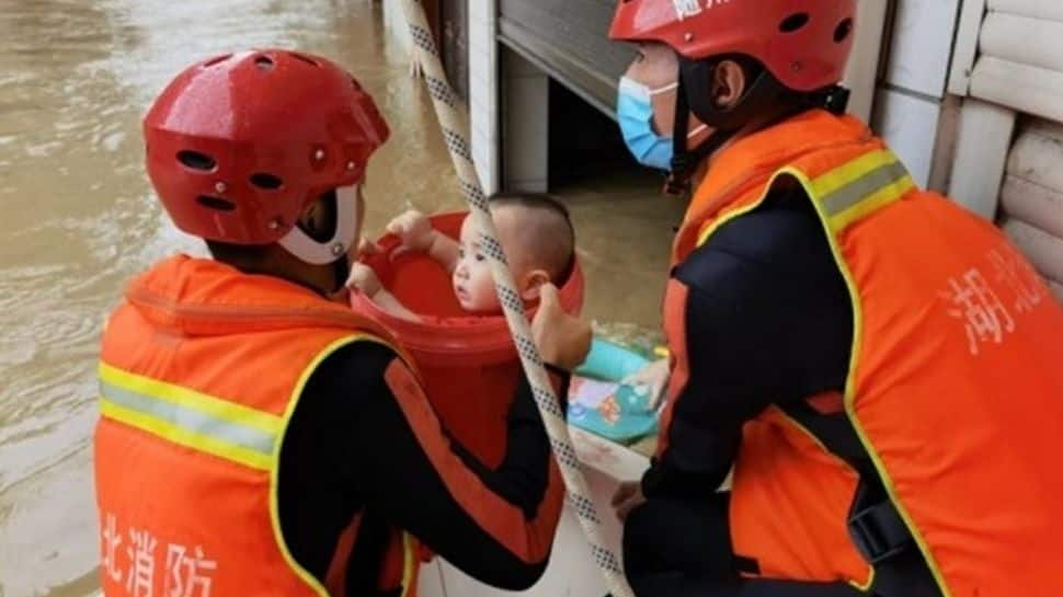 Floodwaters in some parts of China rise up to 16 feet