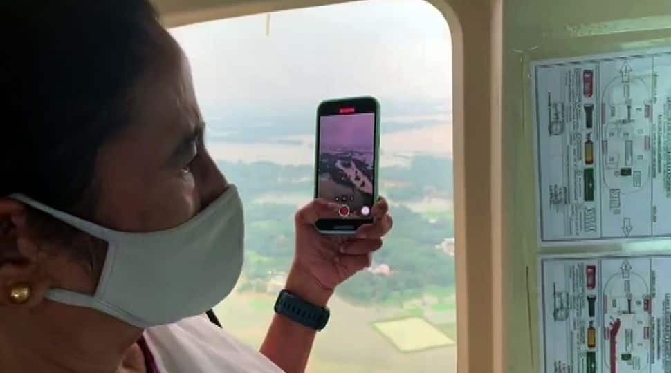 West Bengal Chief Minister Mamata Banerjee conducts an aerial survey of flood-affected areas in Ghatal, Paschim Medinipur district. on Tuesday (August 12).