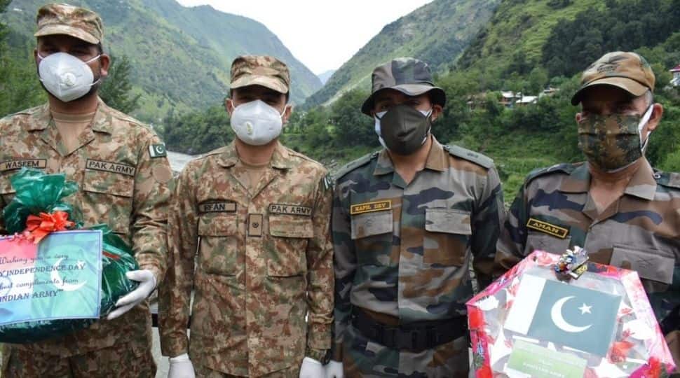 A gesture of friendship on Pak Independence Day: Indian, Pakistani troops exchange sweets along LoC